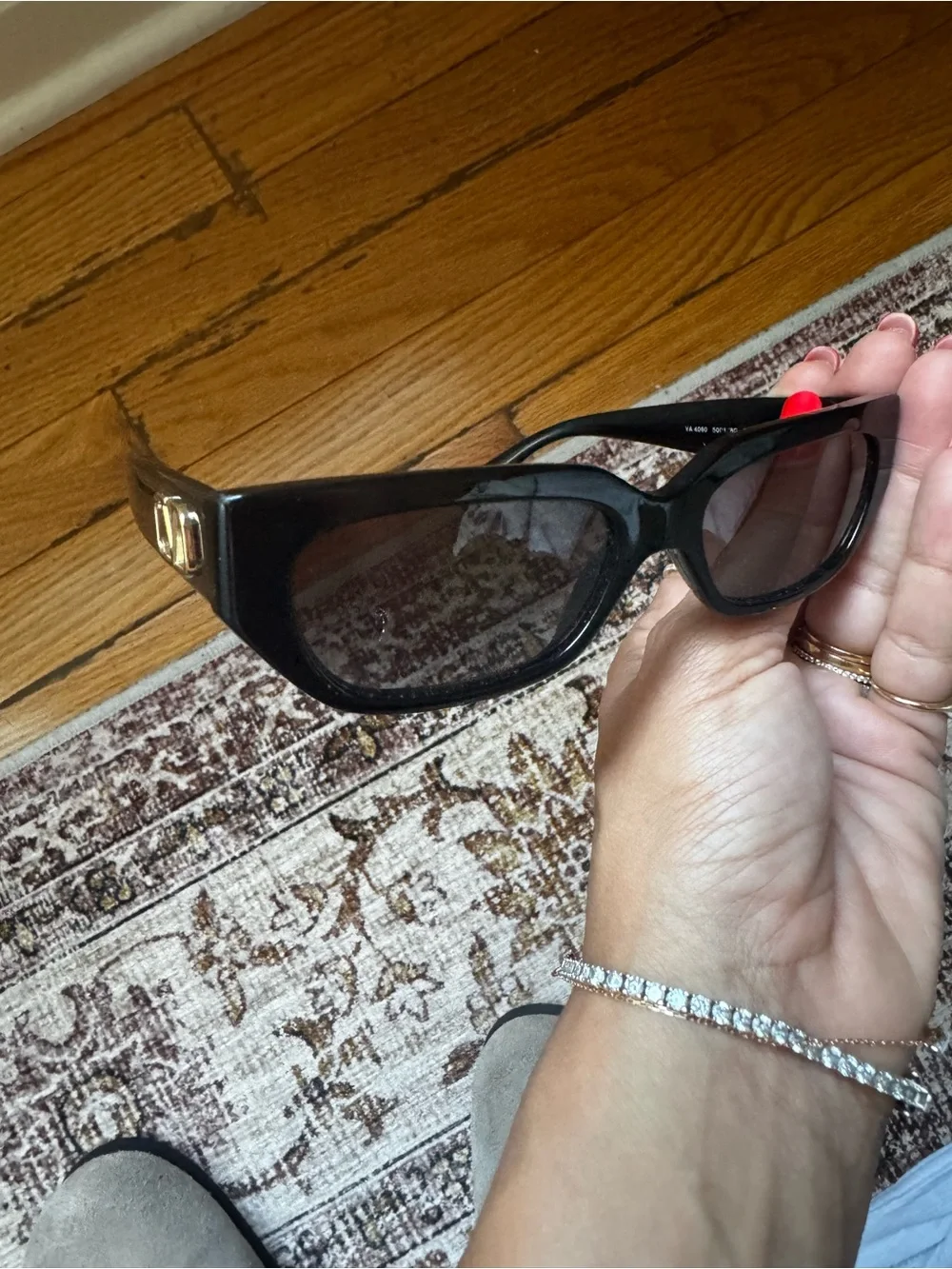 Valentino Black Sunglasses with Gold V Logo Accents